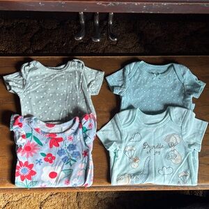 Lot of 4 Blue and Floral Bodysuits 0-3 mos